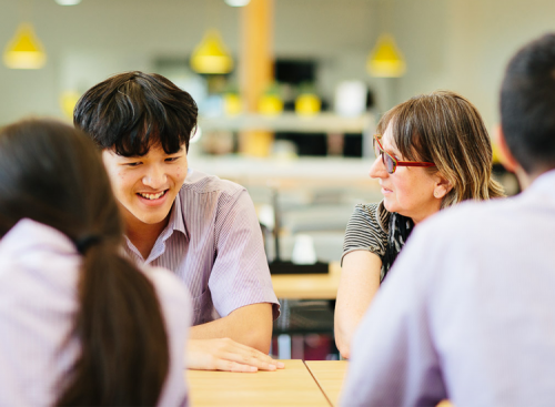 Boarding school Victoria - Male international student talking to a student mentor