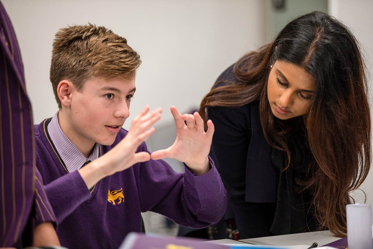 Student explaining and teacher listens