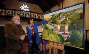 Jeff Makin discusses his painting of Clunes with Dr Helen Drennen, Principal from 2003 to 2018