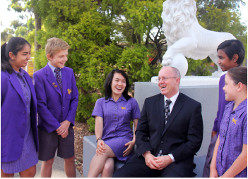 The new Glen Waverley Chaplain, Reverend Graham Bartley, with Middle School students