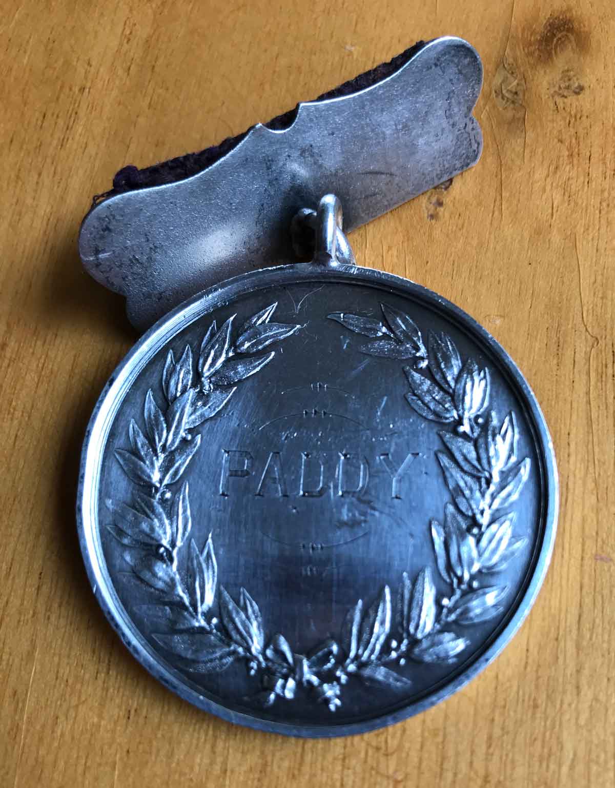 A medal with the name Paddy on it
