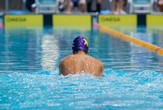 A man swimming in a pool