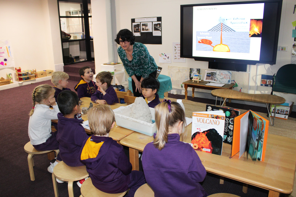 Students in classroom learning about rock cycles