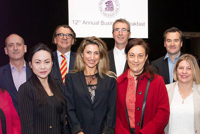 A group of people at a business networking event