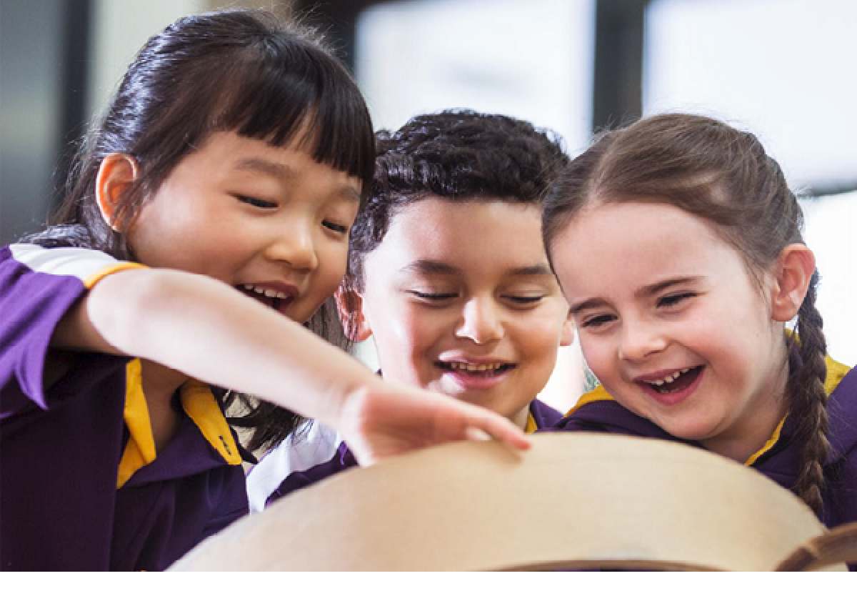 Three children learning together