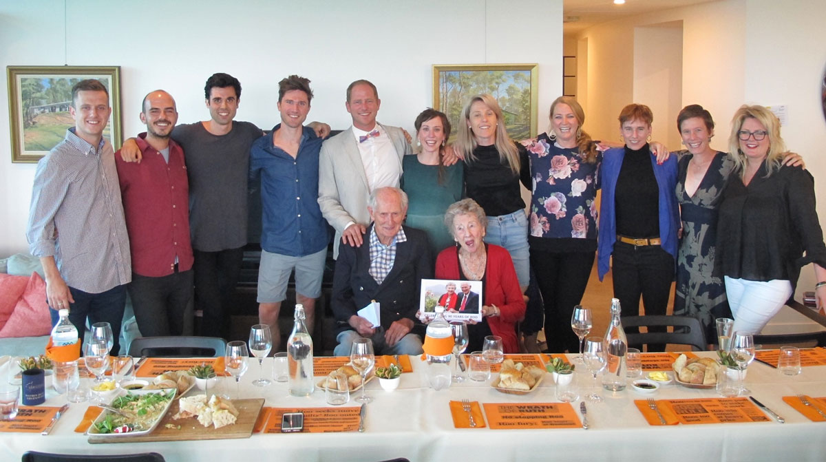 Bob and Ruth Loder surrounded by friends and family