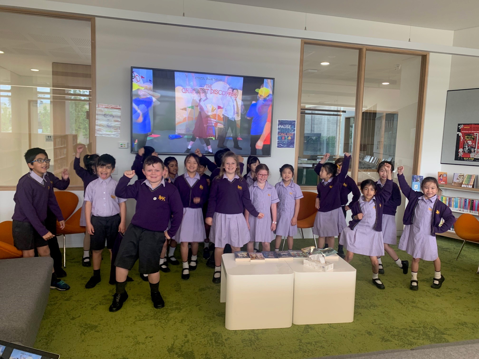 Year 2 class dancing in the library