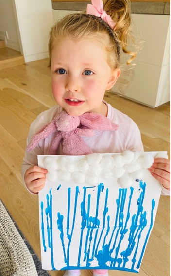 Elsternwick student Rose Sullivan with her rain painting