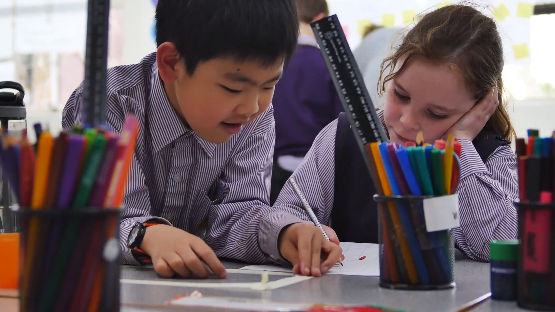 Boy and girl learning together